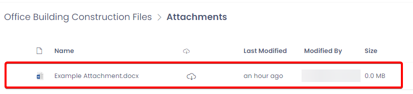 A screenshot of the file now uploaded. The screenshot is annotated in red to show how the file will appear in a list within the component. The File&#39;s name is &quot;Example Attachment.docx&quot;, followed by a download icon, which is a cloud with an arrow pointing downwards. In this example, the file states it was &quot;Last Modified an hour ago&quot;. The &quot;Modified By&quot; column is blurred out to protect the privacy of the user. The file size is 0.0MB as it is an empty document.